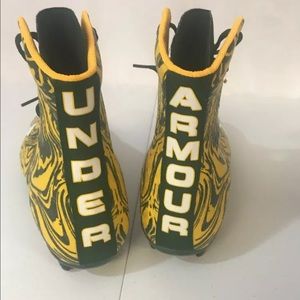 green and yellow football cleats
